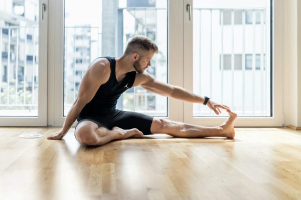 man-practicing-yoga-at-his-home-e1732093933753.jpg